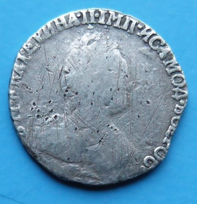 Монета номаналом гривенник 10 копеек. Екатерина II. Белый металл. Российская Империя, 1791 год.