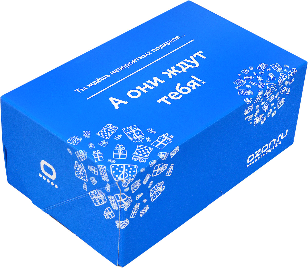 фото Подарочная коробка OZON.ru. Средний размер, "Ты ждешь невероятных подарков, а они ждут тебя!". 23.4 х 14.3 х 9.7 см