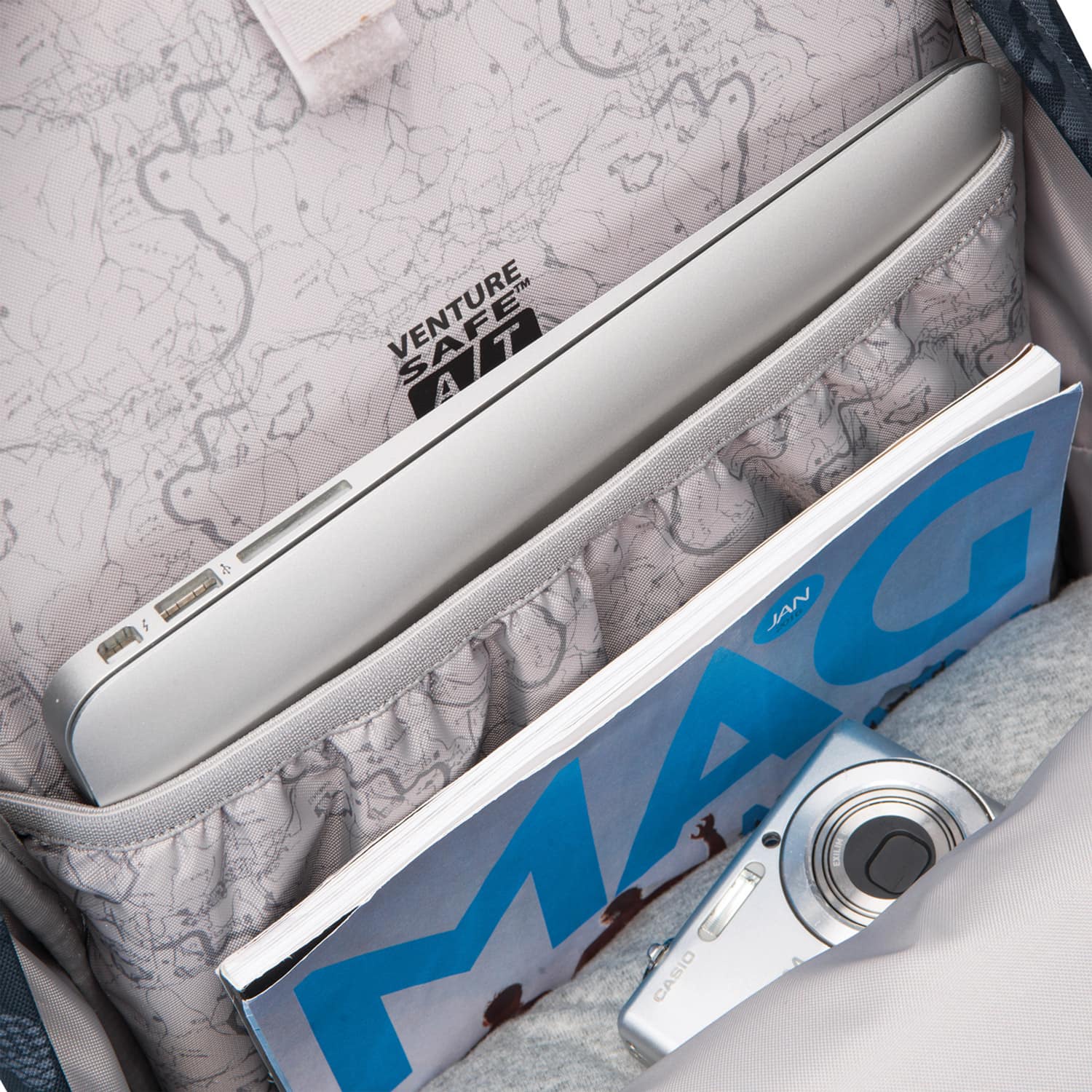 фото Рюкзак для ноутбука Pacsafe Рюкзак антивор Vibe 20, цвет: серый камуфляж, 20 л