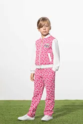 Жаккардовые зауженные к низу брюки из смесового хлопка, с поясом и боковыми карманами. Выполнены из трикотажного  ...