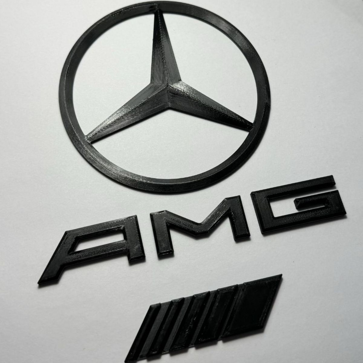 Шильдик на авто Mercedes Benz AMG