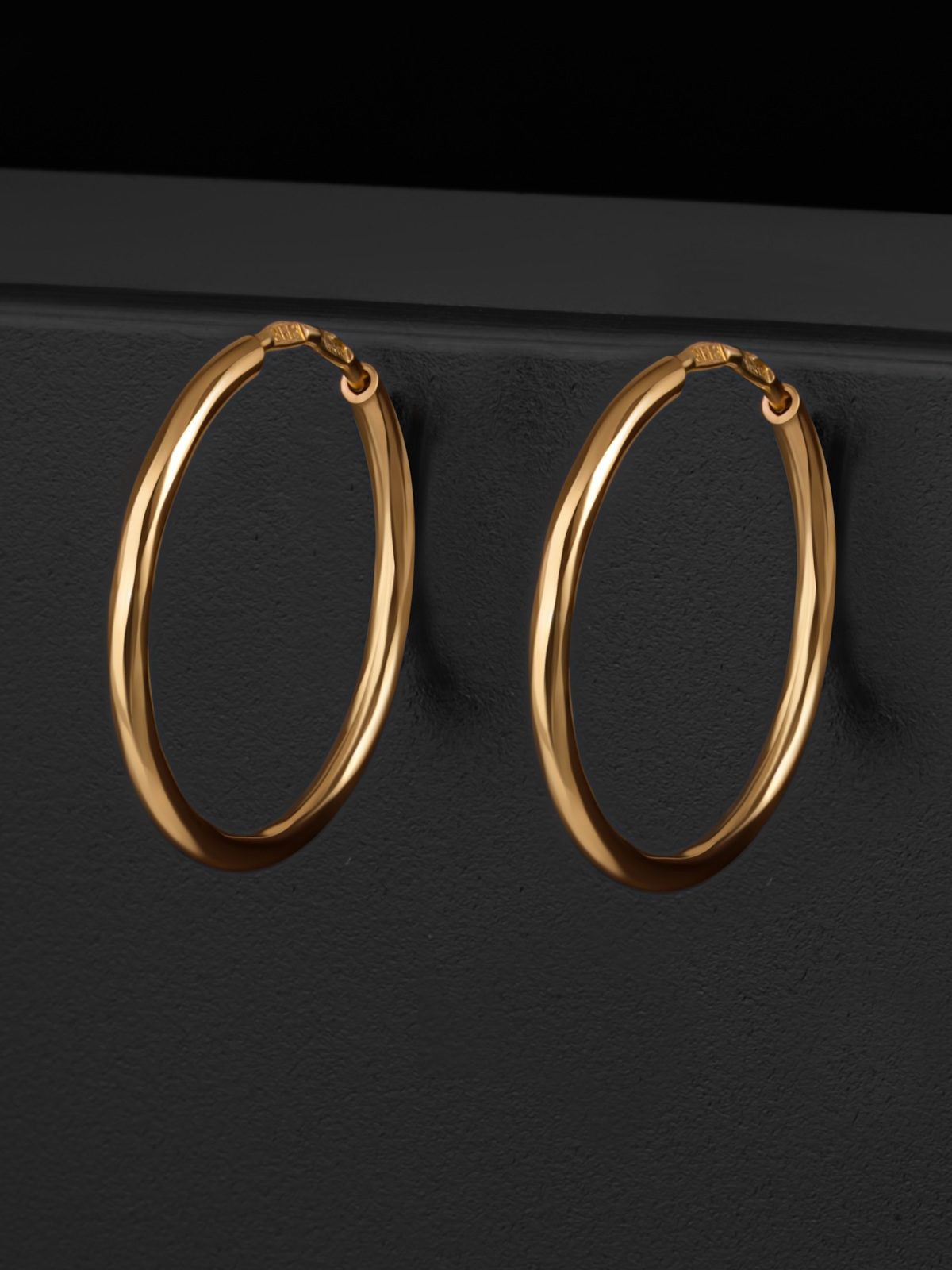 Серьги женские кольца 585