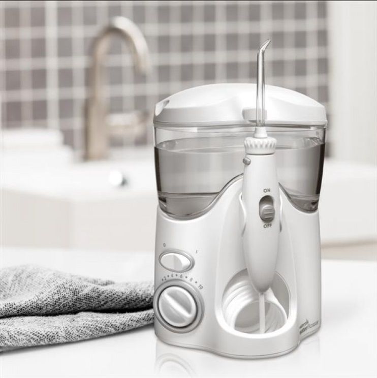 Ирригатор стационарный Waterpik WP-100 E2 Ultra белый, медицинский, 7 насадок, 10 режимов