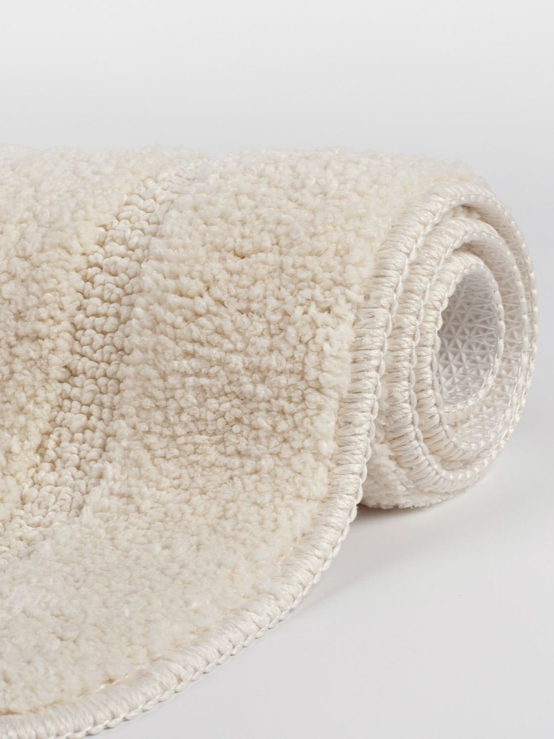 Фото товара на маркетплейсе ozon Коврик для ванной комнаты и туалета 45х65 см, из микрофибры, с коротким ворсом, противоскользящий, бежевый, IDDIS, PSQS02Mi12