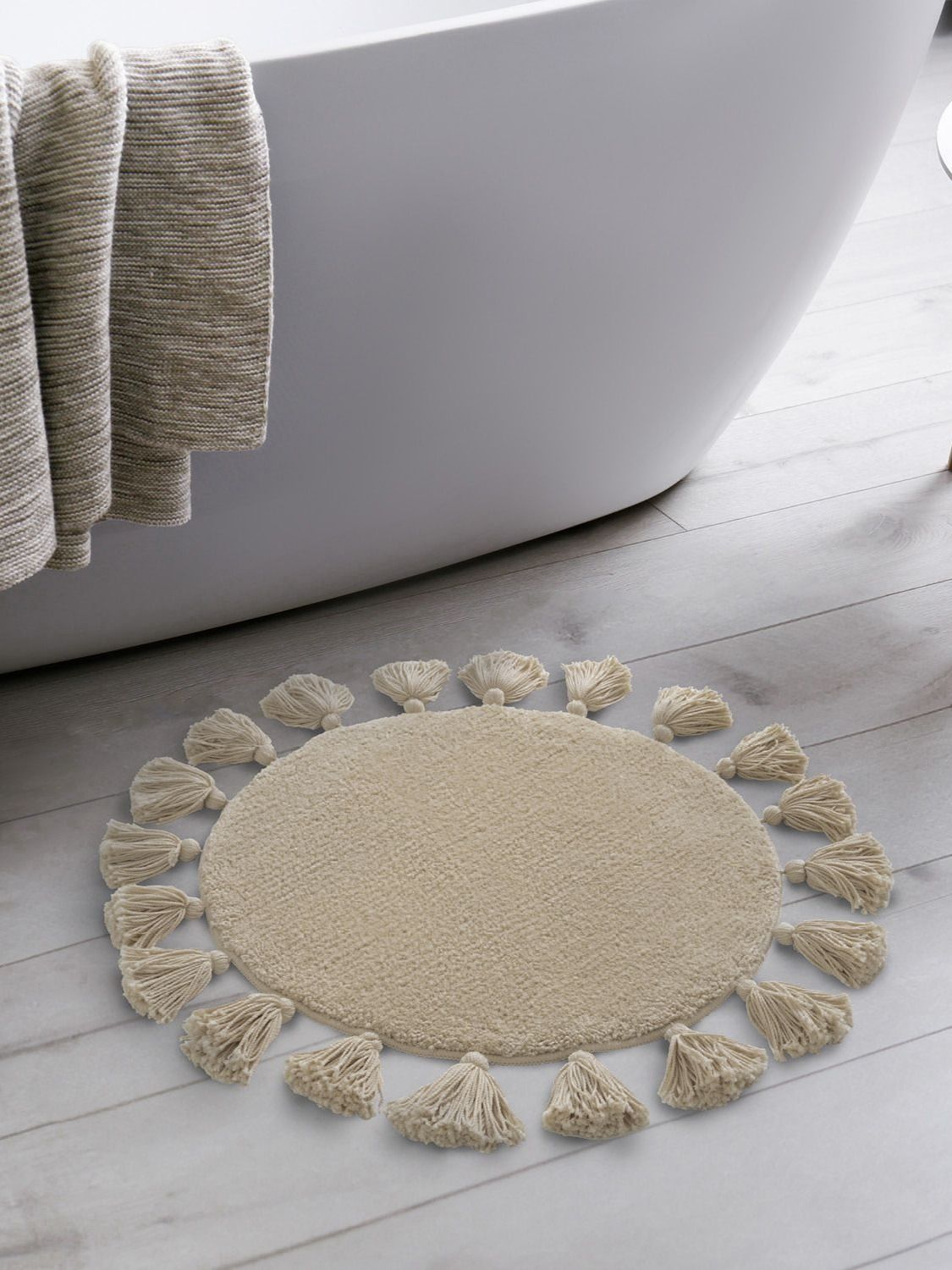 Фото товара на маркетплейсе ozon Коврик для ванной комнаты ,с кисточками круглый, 55 см, микрофибра, бежевый, IDDIS, DTR02P5i12