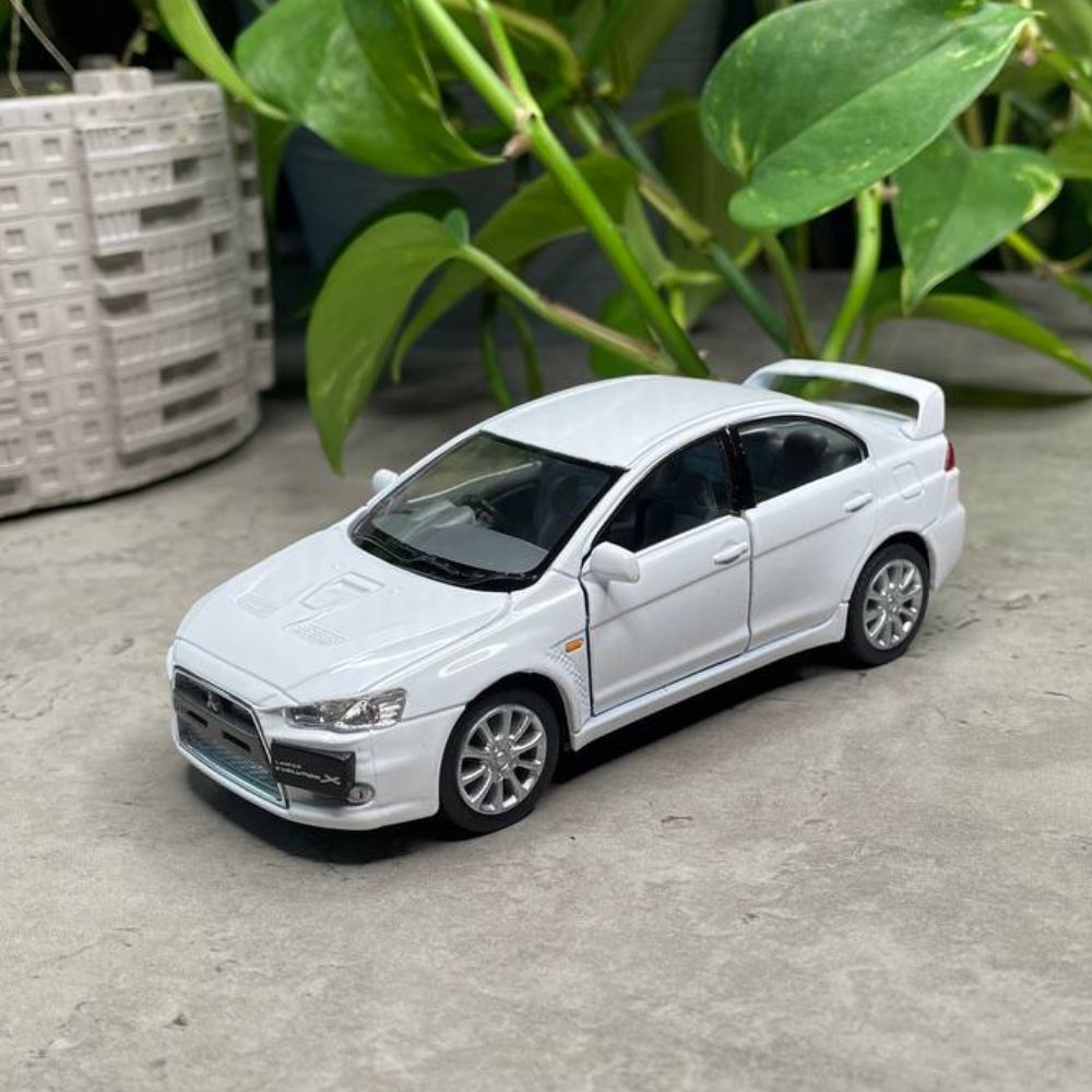 Машинка металлическая Митсубиши Лансер Эволюшен Mitsubishi Lancer Evolution  Х Kinsmart 1:36 5329DKT инерционная, цвет Белый - купить с доставкой по  выгодным ценам в интернет-магазине OZON (361233055)