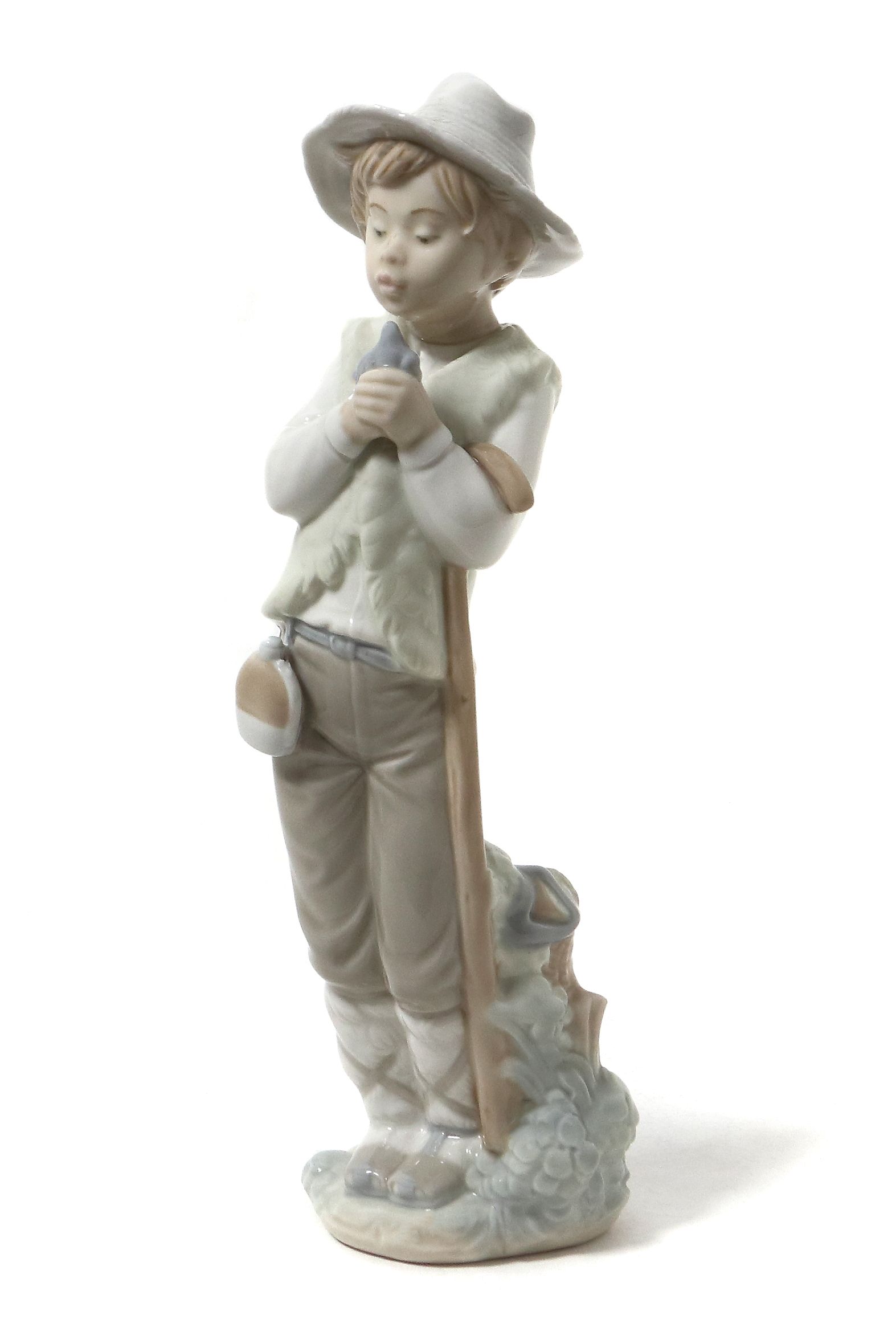 Фарфоровая фигура "Мальчик с птицей". Испания, NAO by Lladro.