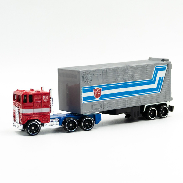 Машинка Hot Wheels ОПТИМУС ПРАЙМ с прицепом Track Fleet Optimus Prime в ...