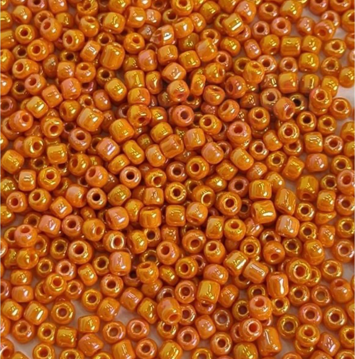 Бисер прозрачный с сереб. покрытием оранжевый хамелеон 20352 вес 50 гр