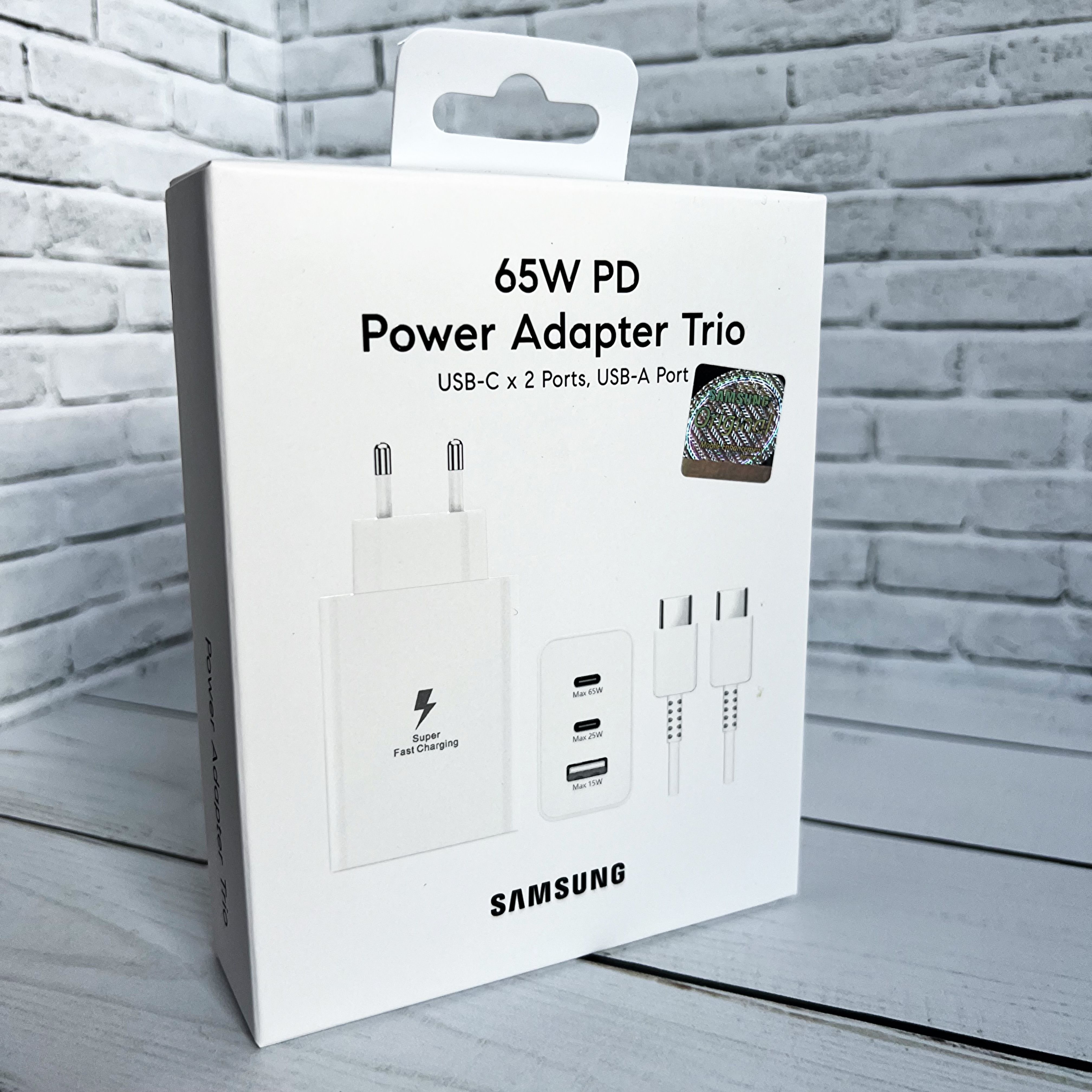 БыстраязарядкадлясмартфонаSamsung65WUSB-C/USB-APowerAdapterTrioбелый