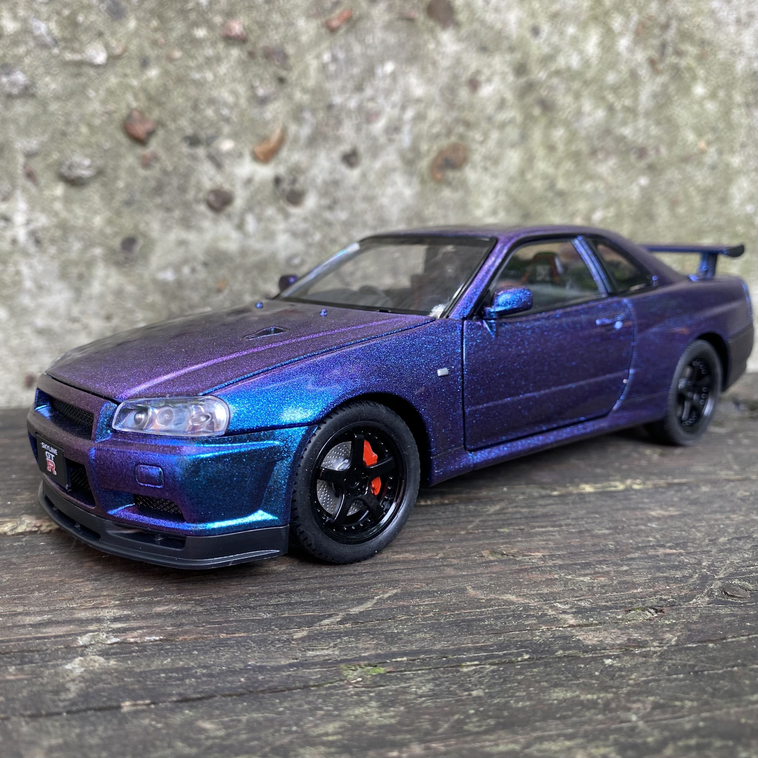 Модель автомобиля Nissan Skyline GT-R R34 синий металлик