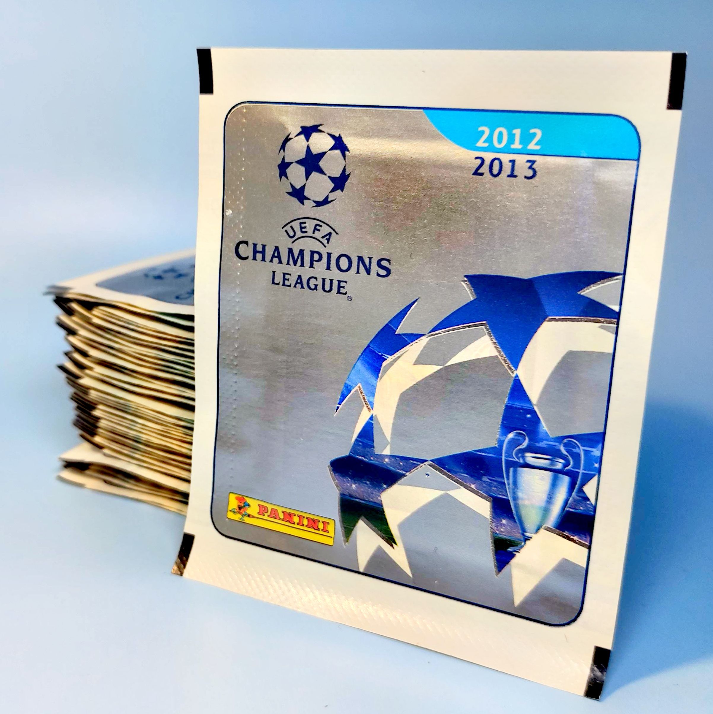 25 пакетиков наклейки panini Лига Чемпионов 2012-2013