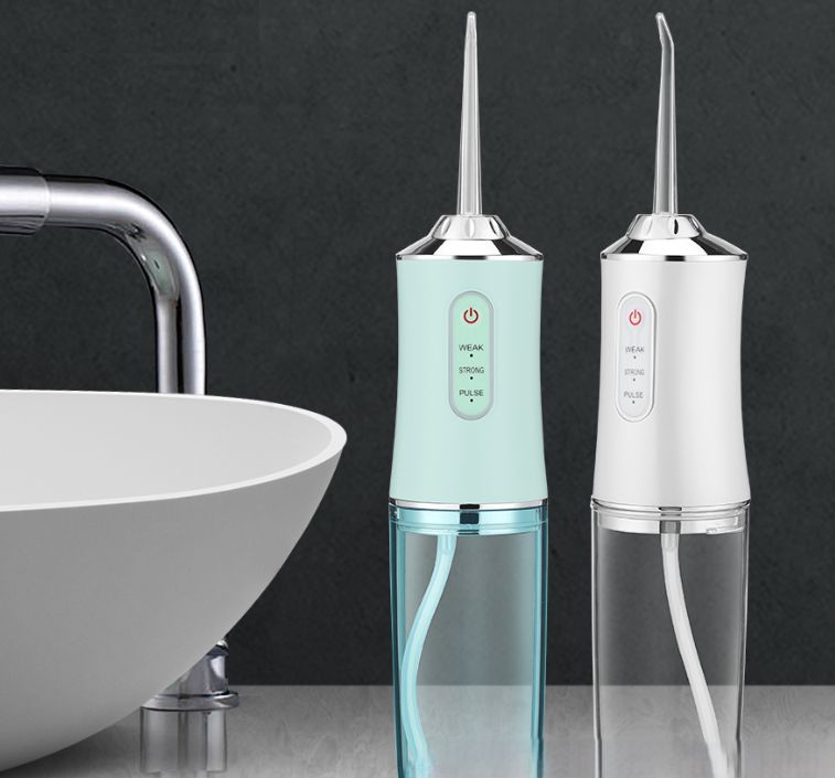 Ирригатор (флоссер) для гигиены полости рта Oral Irrigator, 4 сменные насадки (зеленый)