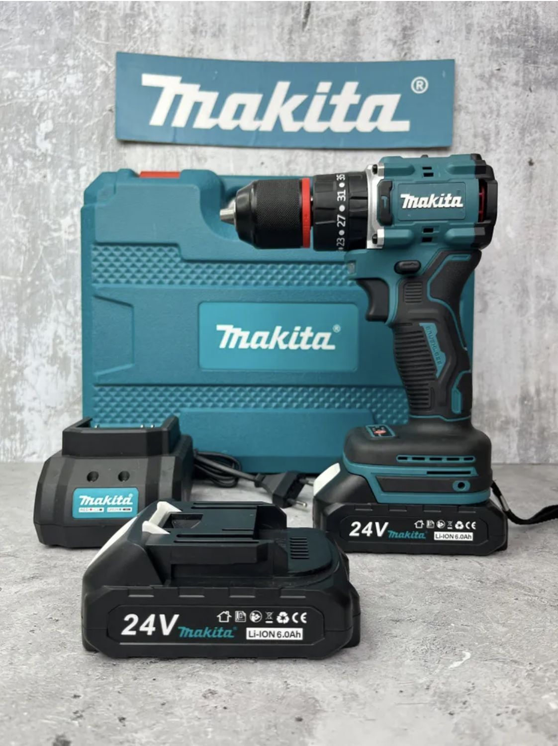 Дрель-шуруповерт Makita 24v бесщеточный, 90-130 Нм, с набором и 2 АКБ