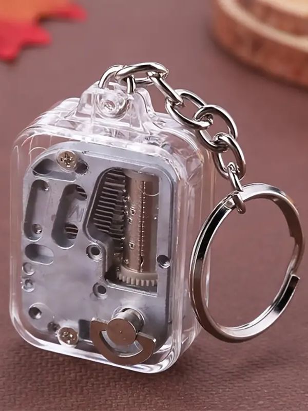 Прозрачнаяминимеханическаямузыкальнаяшкатулка,металлическийспортивныйбрелок