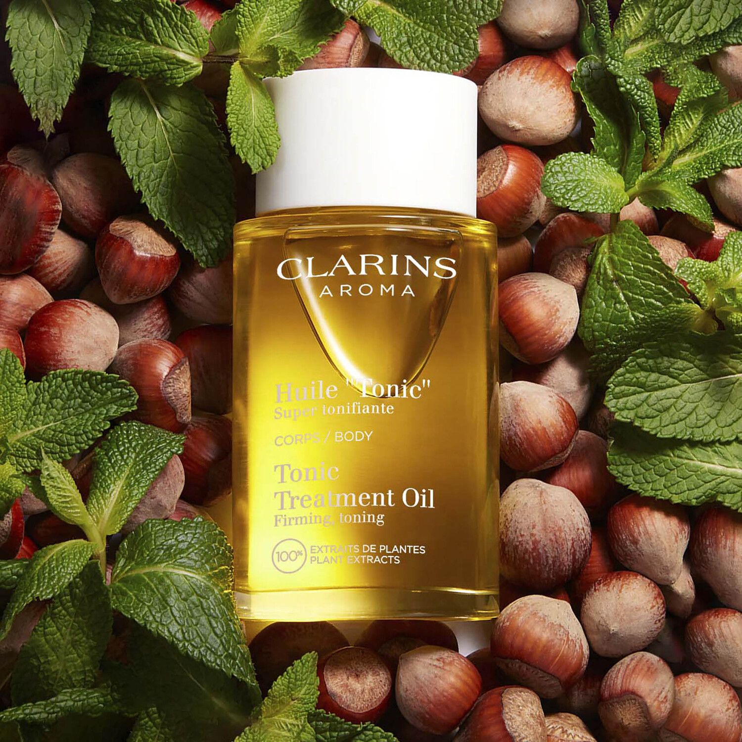 Clarins huile oil. Тоник для тела. Тоник кларанс. Масло от кларанс. Бальзам для тела Clarins Aroma Tonic Hydrating.