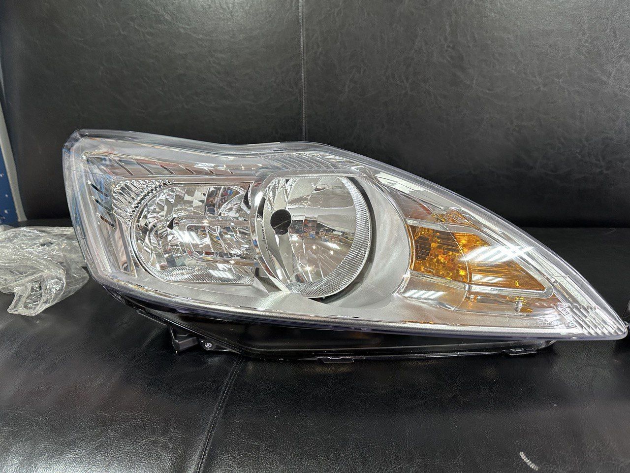 Фара фокус 2 рест. Фара rh tr&#039;11- ford 1714642.