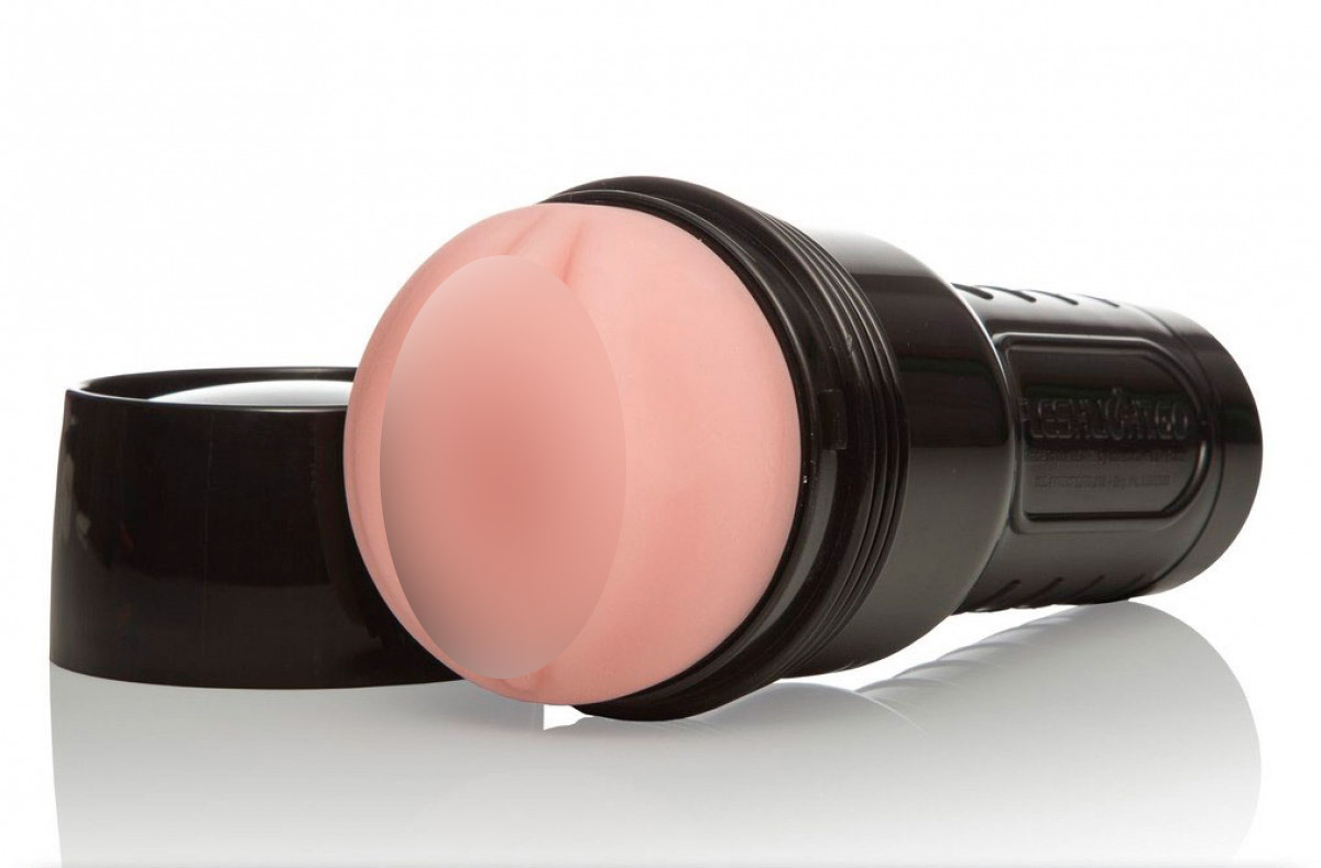 Мастурбатор в форме фонарика с уникальным рельефом FLESHLIGHT PINK GO Surge...