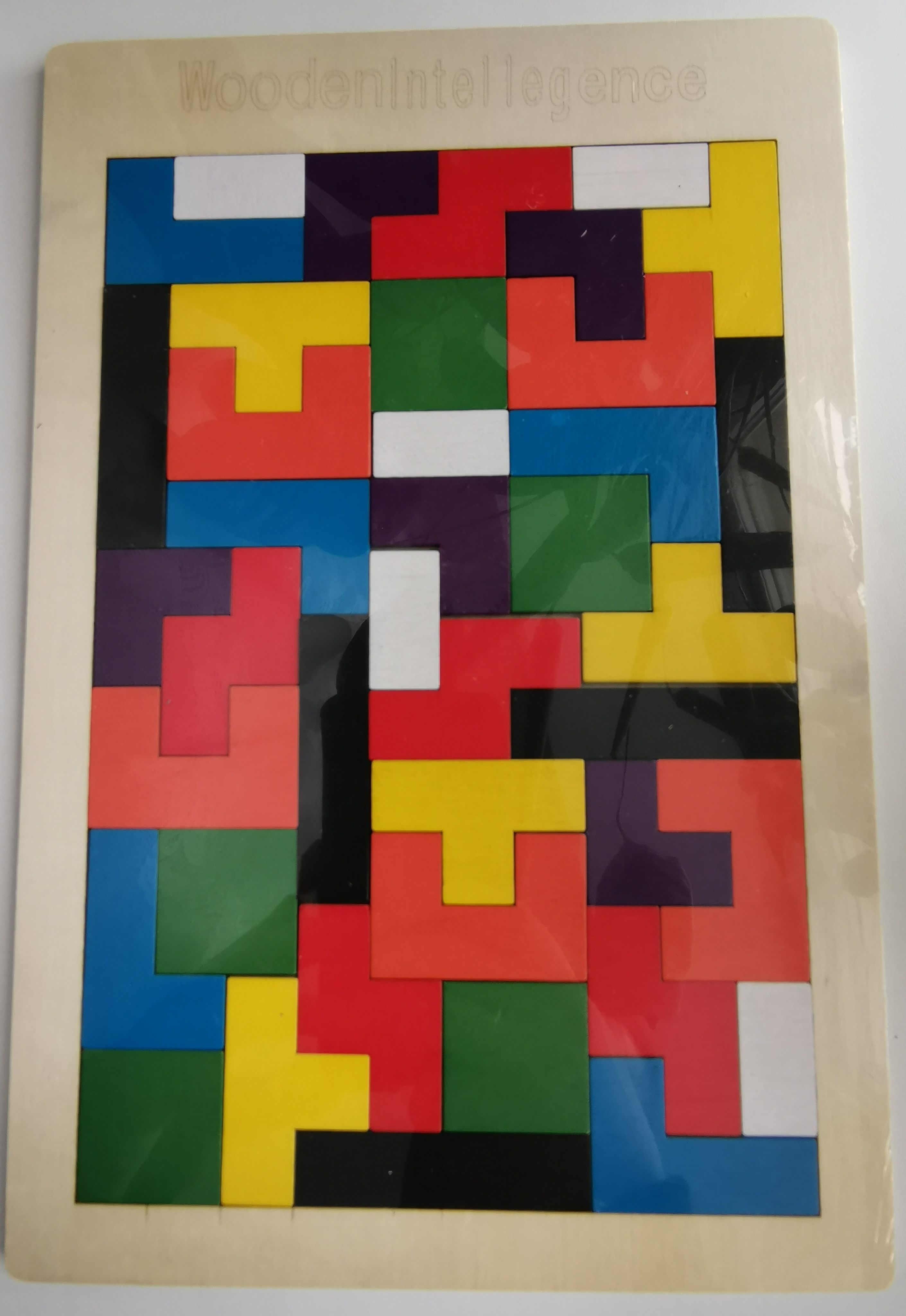 Головоломка тетрис играть. Wood Intelligence Тетрис. Головоломка Wooden Puzzle Тетрис танграм. Головоломка Тетрис Монтессори. Головоломка "Тетрис" (27х18 см).