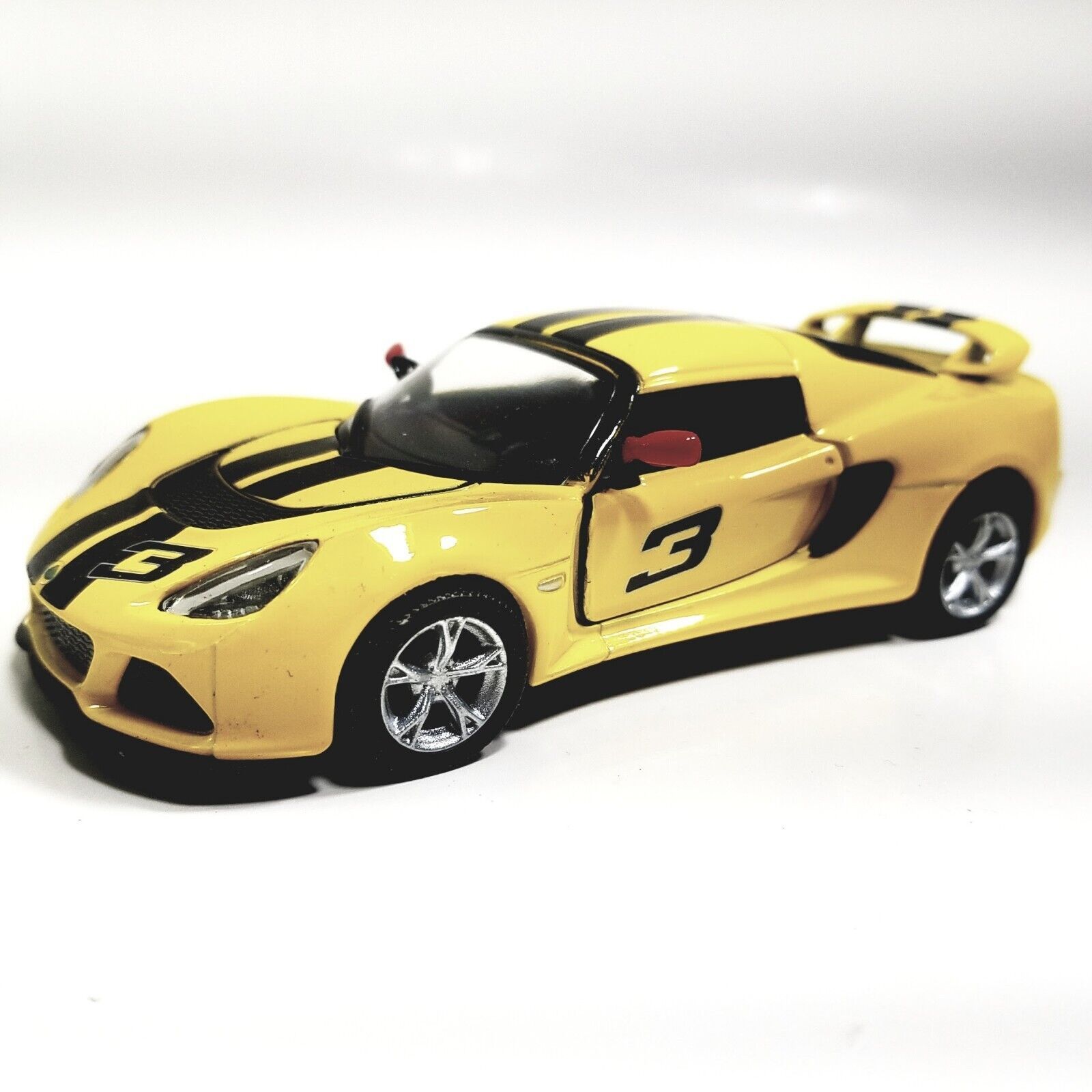 Машинка металлическая Лотус Эксиж Kinsmart 1:32 2012 Lotus Exige S 5361DFKT  инерционная, цвет Желто-черный - купить с доставкой по выгодным ценам в  интернет-магазине OZON (539029254)