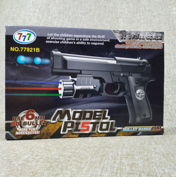 Детский игрушечный пистолет с лазерным прицелом.Стреляет пластиковыми ...