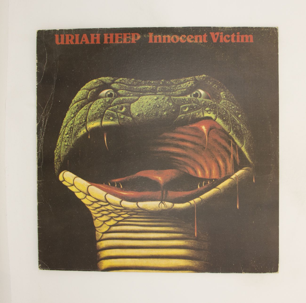 Innocent victim uriah heep. Uriah Heep innocent victim 1977. Обложка альбома Uriah Heep - innocent victim (1977). Uriah Heep змея. Uriah Heep innocent victim фото.