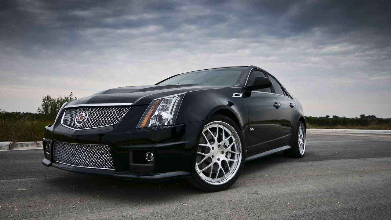 Темно передний. Cadillac CTS V Wagon. Кадиллак КТС обвес. Cadillac STC stance. Мойка Кадиллака.