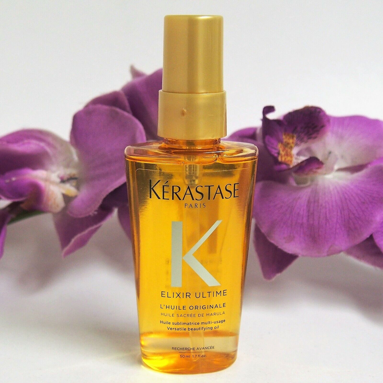 Масло для волос керастаз. Kerastase, масло Elixir ultime versatile Beautifying Oil. Kérastase Elixir ultime Oil Serum. Масло Kerastase 50 мл. Масло золотое для волос Керастаз.