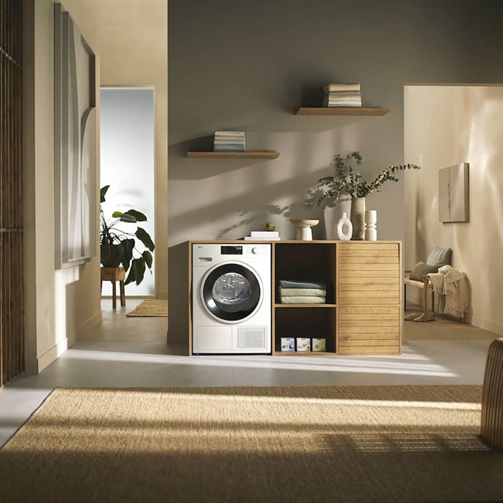 Miele home. Сушильная машина Miele. Фильтр для ворса в стирально сушильной машине. Miele t1 сушильная машина. Сушильная машина над стиральной.