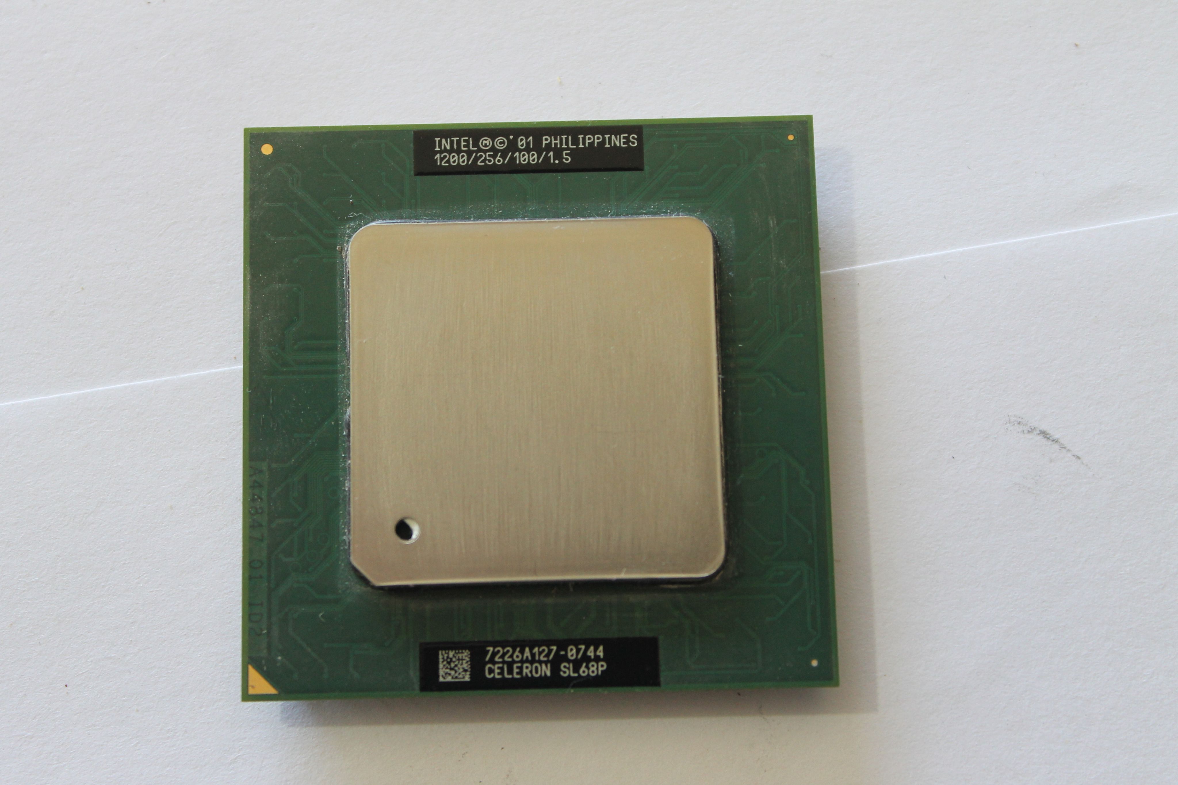 Процессор celeron e1200. Celeron 1200. Intel celeron e1200. Celeron 1200. Celeron 2.