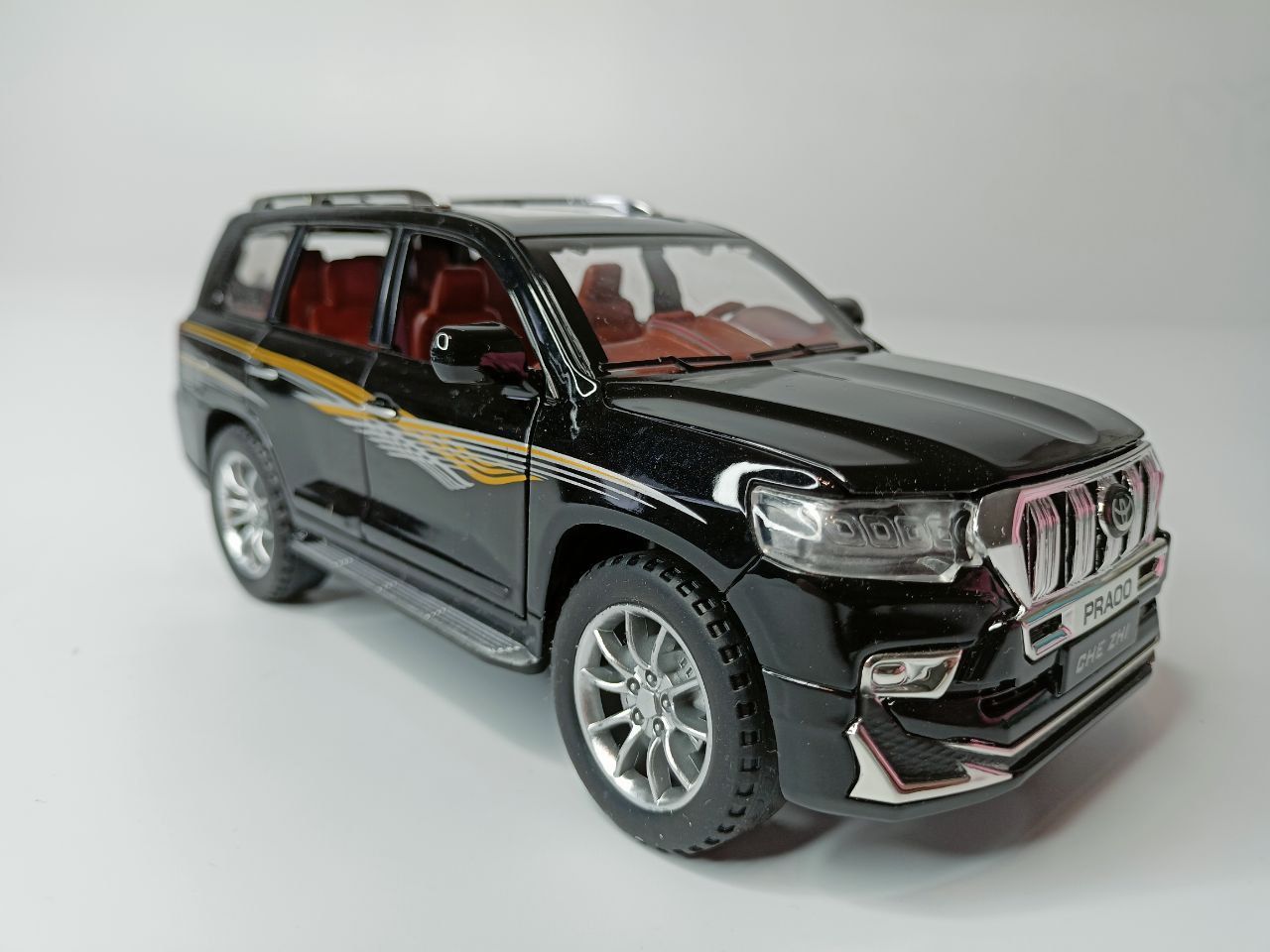 Модель автомобиля Toyota Land Cruiser Prado коллекционная металлическая игрушка масштаб 1:24 черный