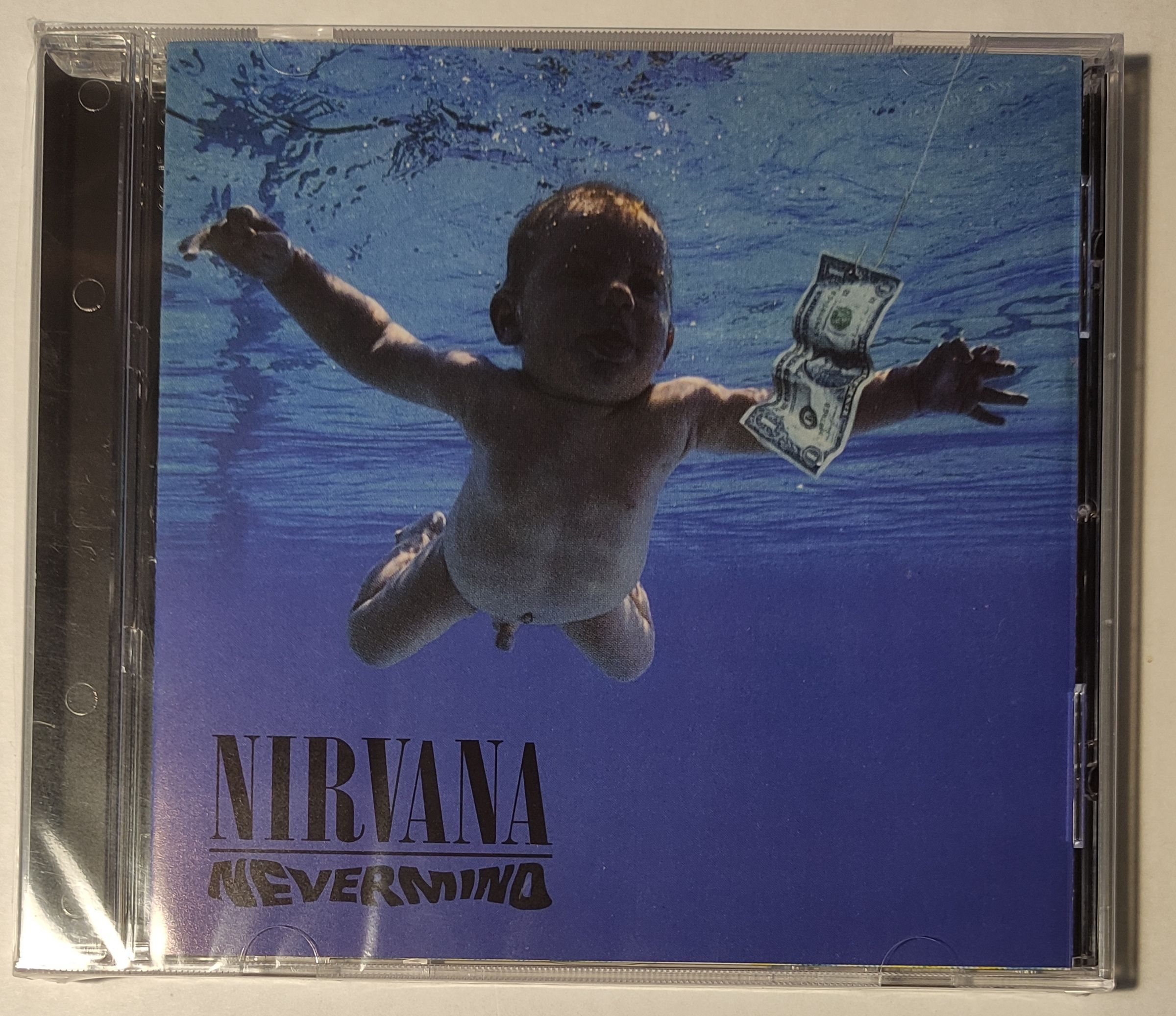 LP Nirvana: Nevermind. Нирвана обложка с ребенком. Nirvana Nevermind кассета. Nirvana stay