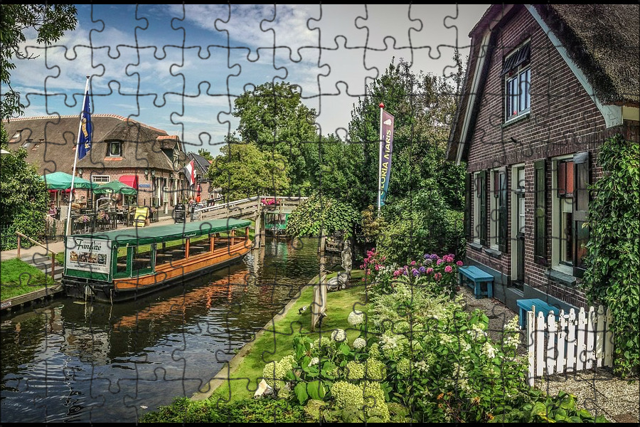Деревня лосдрехт в нидерландах фото Магнитный пазл 27x18см."Giethoorn, праздничный день, деревенский" на холодильник