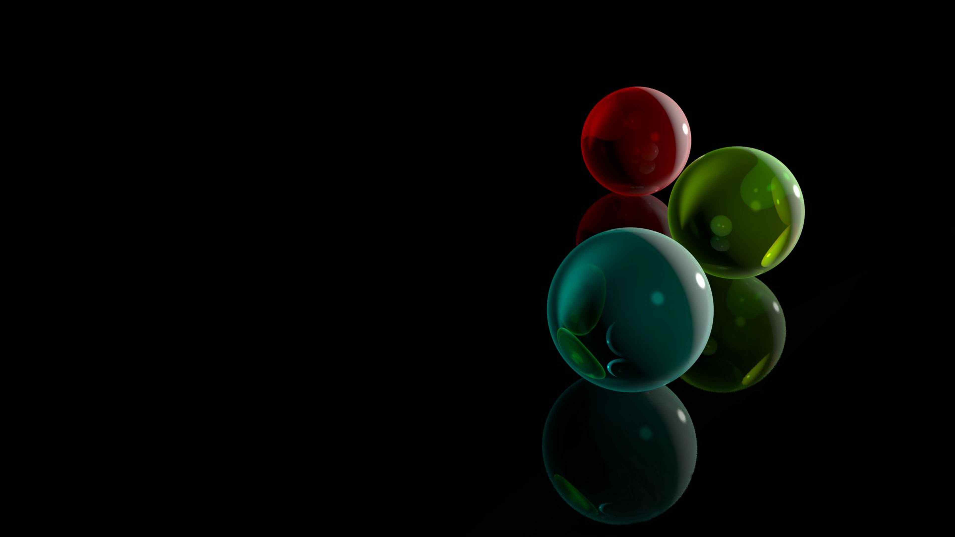 Черно зеленые шарики. Цветные шарики. Цветные шары на черном фоне. Шарики на темном фоне. Заставка на рабочий стол шарики.