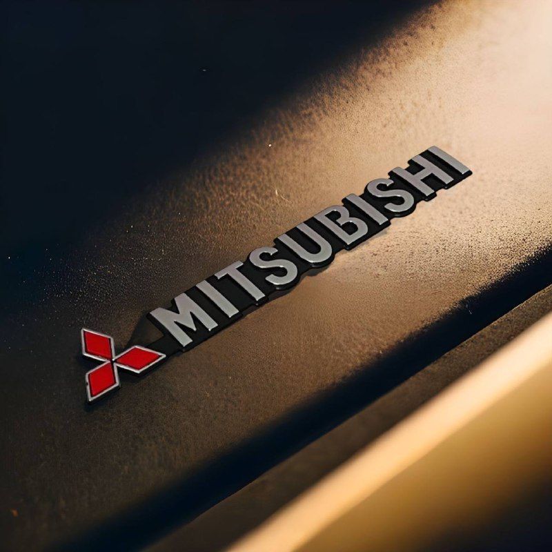 Значок Mitsubishi карбон