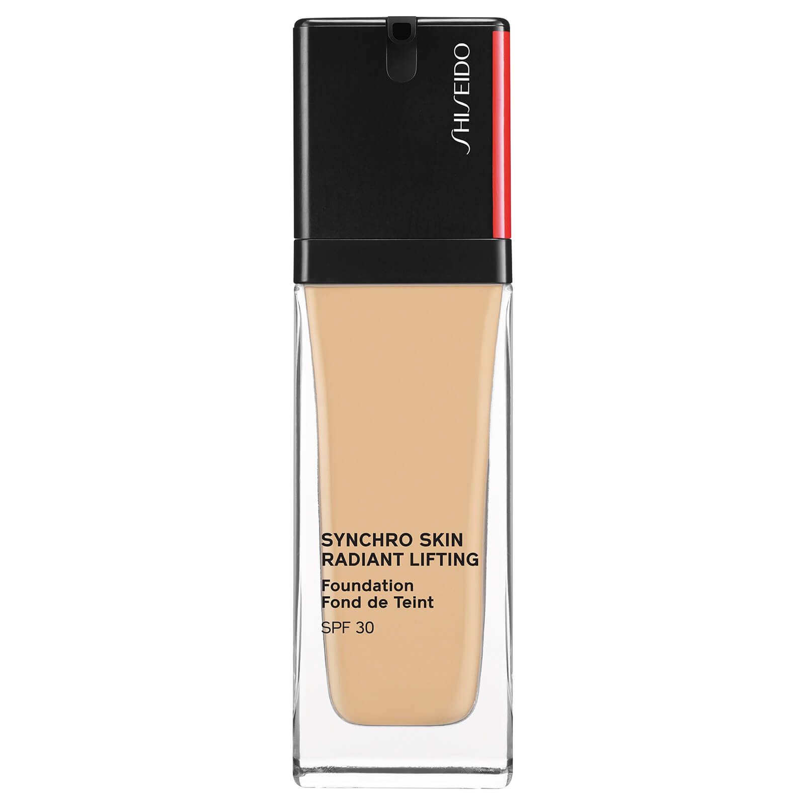 Shiseido synchro skin radiant lifting foundation. Шисейдо тональный крем Synchro Skin. Тональный крем Shiseido 210 Birch. Тональный крем шисейдо с лифтинг эффектом. Тональный крем шисейдо синхро скин Радиант лифтинг.