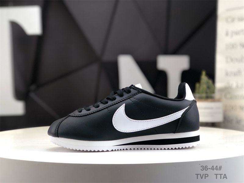 Nike cortez 2024 noir et or