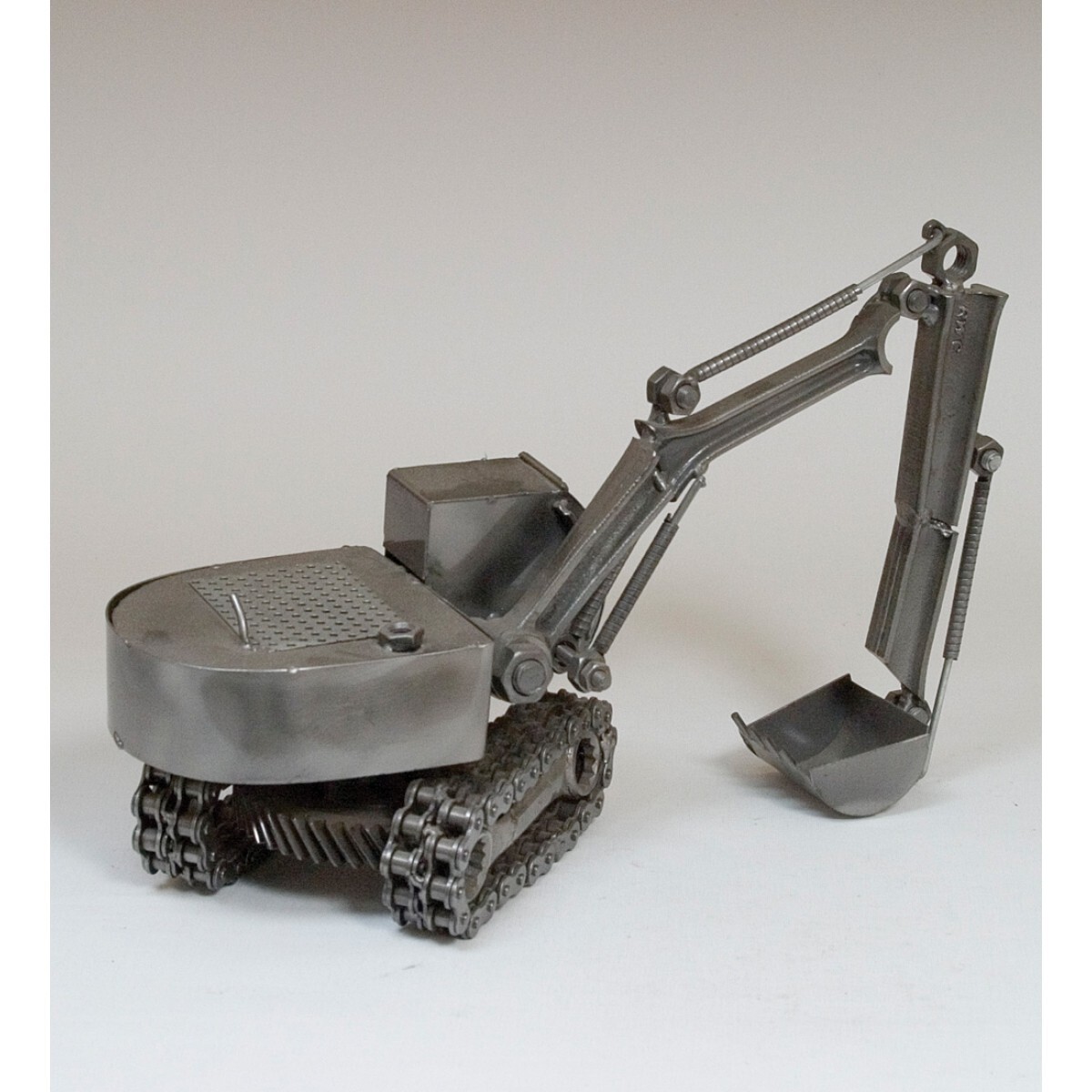 каталка-толокар rolly toys digger xl. мини-экскаватор bobcat e19. поворотный узел стрелы мини экскаватора. экскаватор с педалями. Mini skid steer loader.