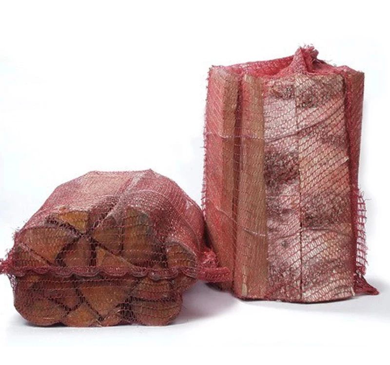 упаковка дров в сетки. дрова березовые в сетках. дрова береза в сетке. дрова березовые в сетке. дрова камерной сушки в сетках.