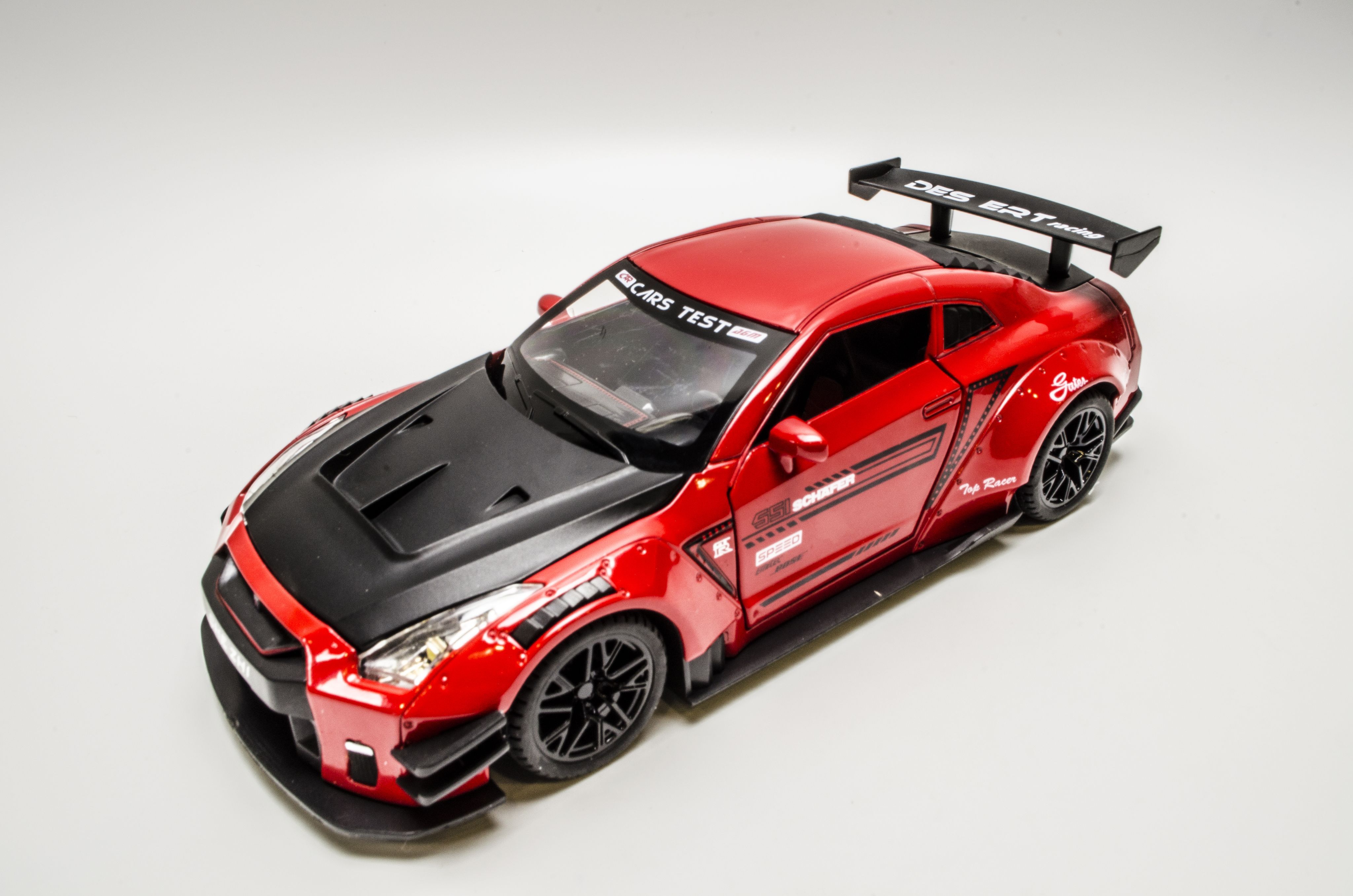 Коллекционная металлическая машина 1:24 Nissan GTR racing - купить с  доставкой по выгодным ценам в интернет-магазине OZON (906858427)