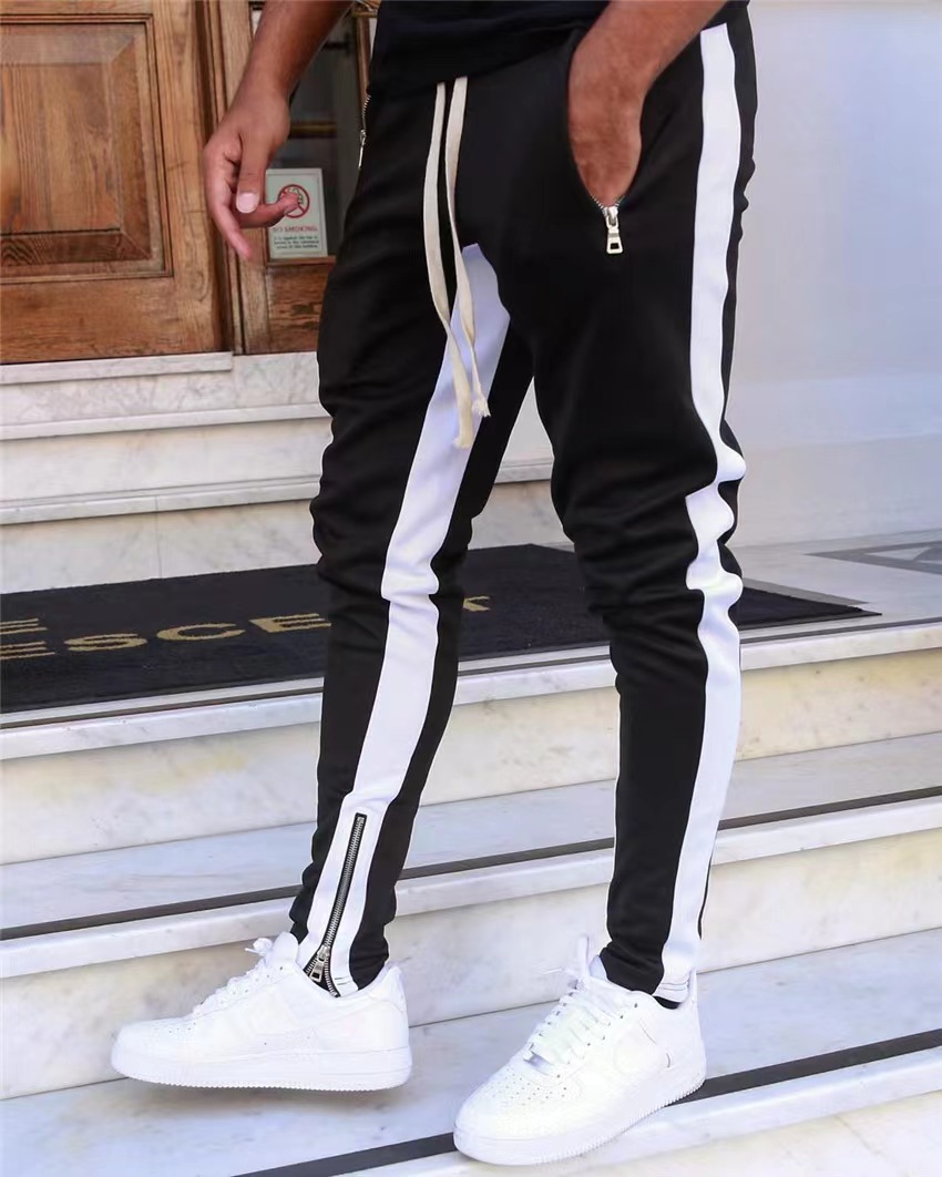 Спортивные штаны с молнией по бокам. Balmain спортивный костюм. Разминочные штаны ray. Штаны с молнией по бокам. Белые спортивные штаны.