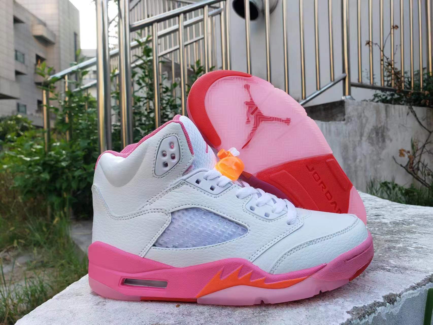 Pink and red jordans best sale