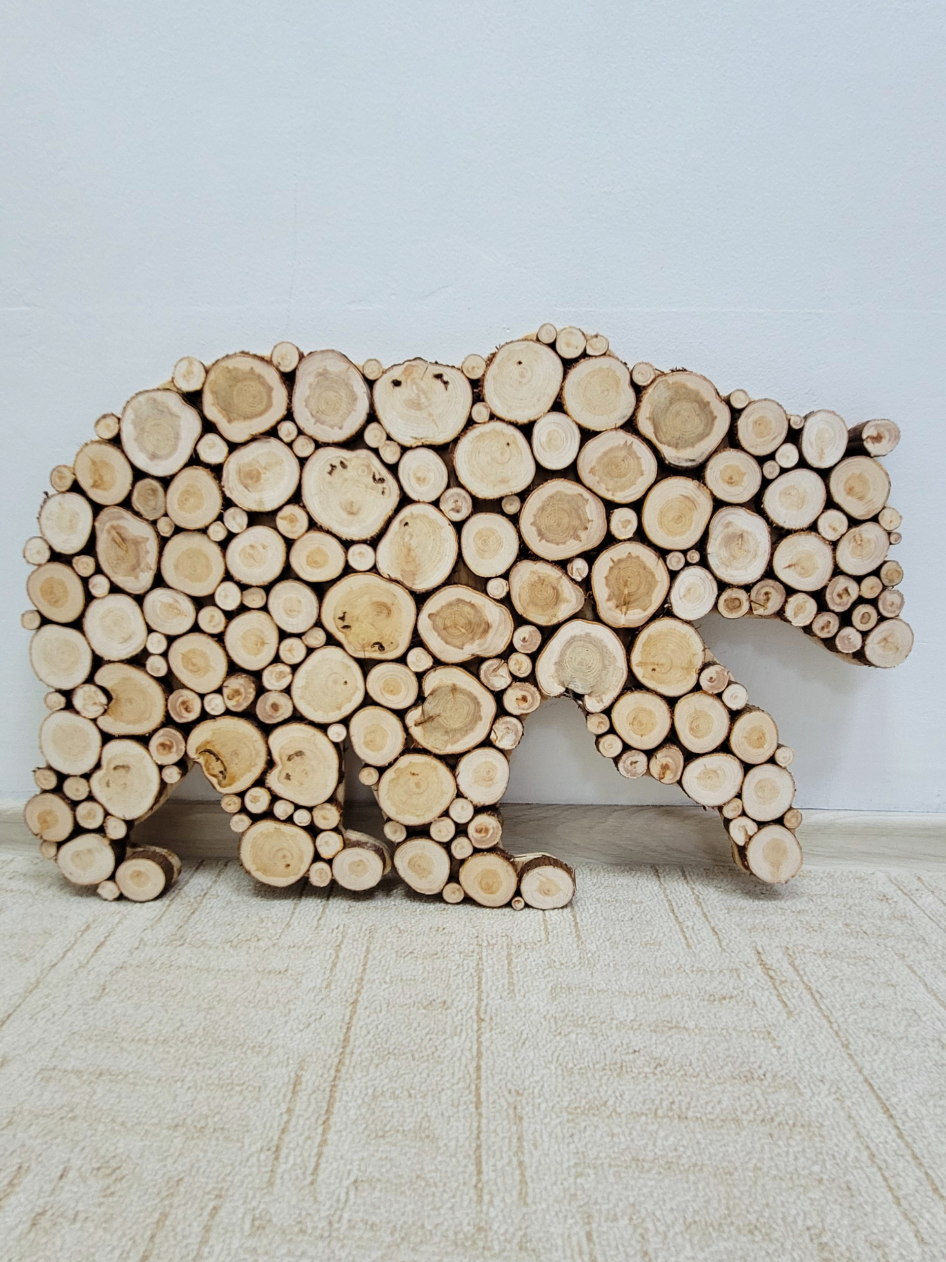 панно из можжевельника в форме медведя. мишка из можжевельника в парной. можжевеловое панно медведь. панно из можжевельника медведь.