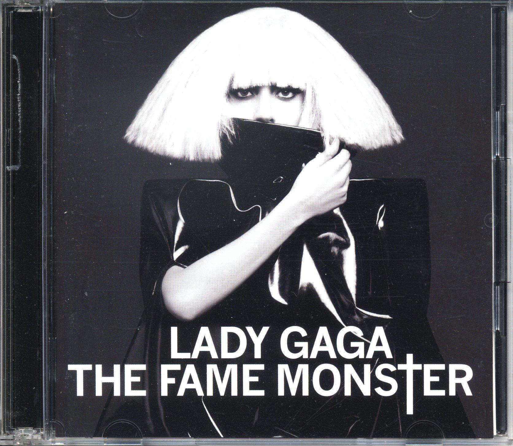 Lady gaga game. Леди Гага the Fame Monster. Леди Гага альбом the Fame. Леди Гага the Fame Monster альбом обложка. Леди Гага Poker face.