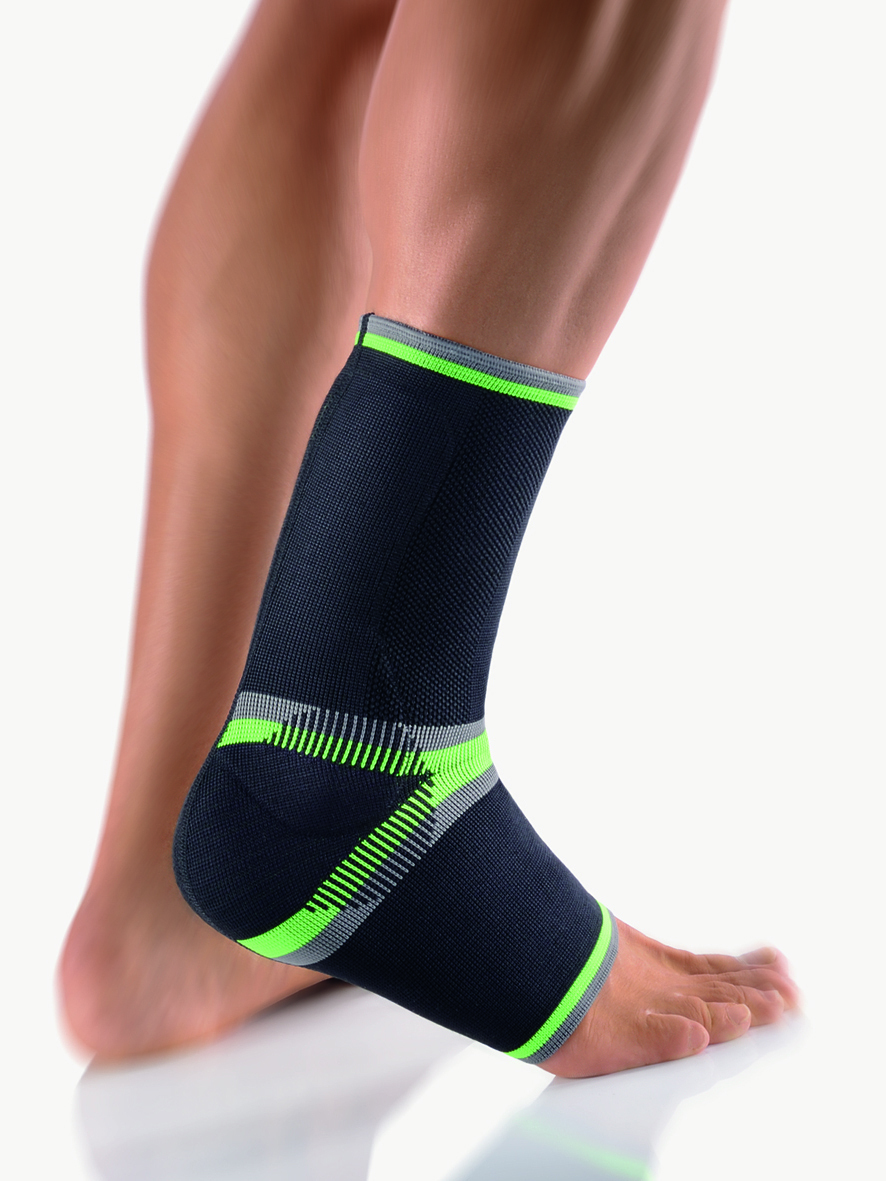 Спортивные голеностопы. Голеностопный бандаж mdvtorg. Бандаж для голеностопа спортивный. Бандаж на голеностоп зеленый. Голеностопный бандаж чёрно/зелёный.