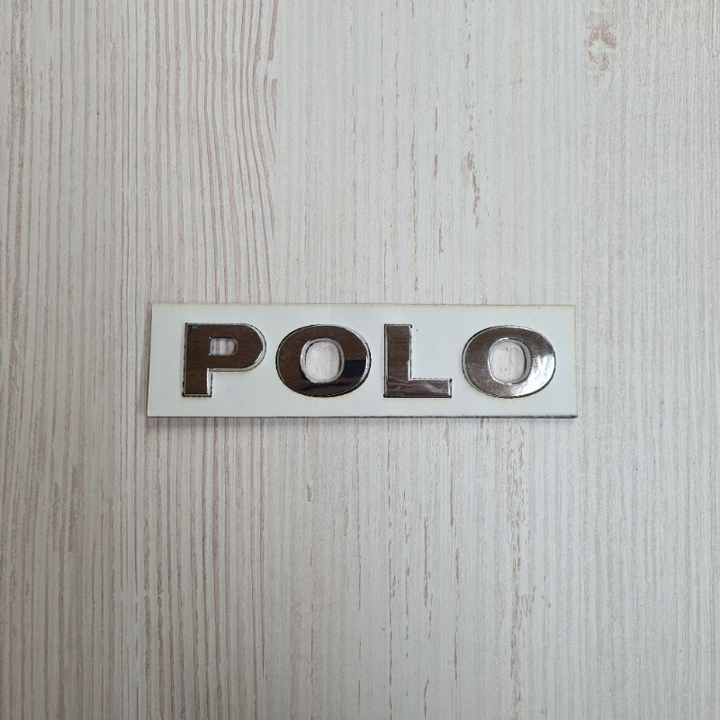 Как выглядит оригинальный значок поло Надпись POLO / Поло 13х2,5 см VOLKSWAGEN / Фольксваген - купить по выгодным цена