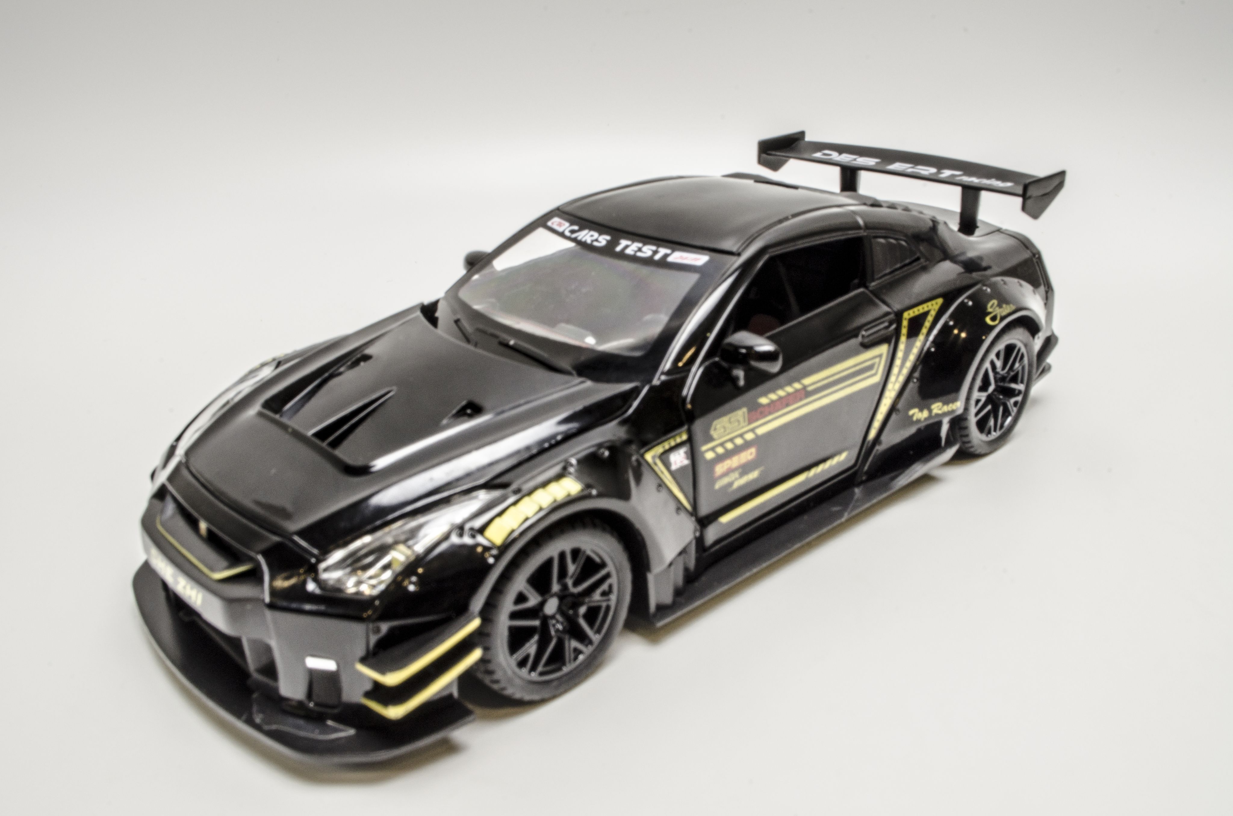 Коллекционная металлическая машина 1:24 Nissan GTR racing - купить с  доставкой по выгодным ценам в интернет-магазине OZON (906826370)