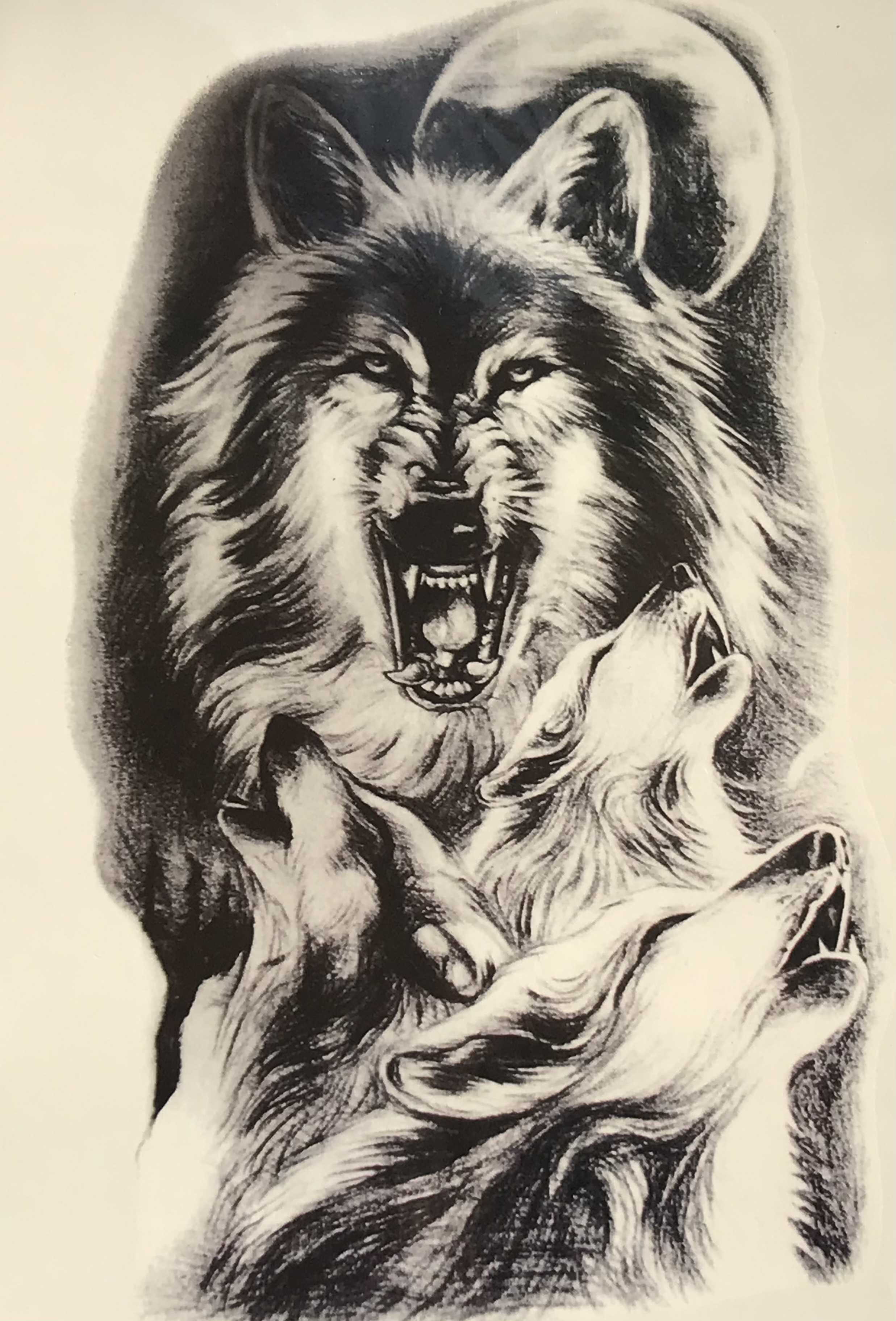 татуировки мужские на плече волк с оскалом