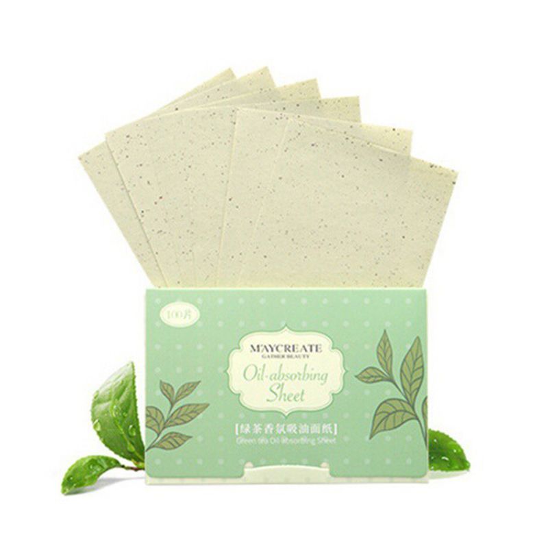 Oil absorbing paper