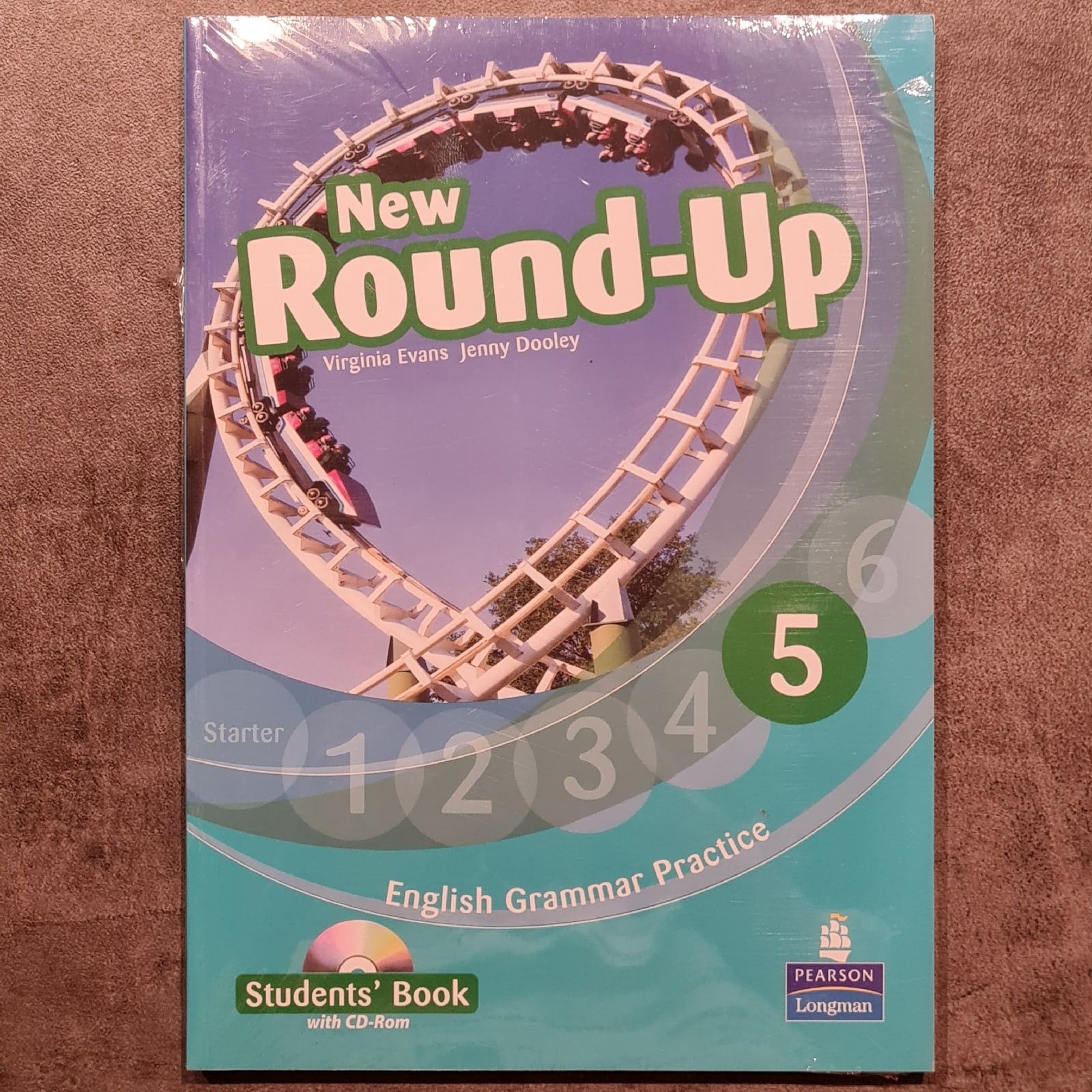 New round up 5 students book. Учебник Round up. Английский New Round up Starter. Раунд ап 4. Дженни Дули.